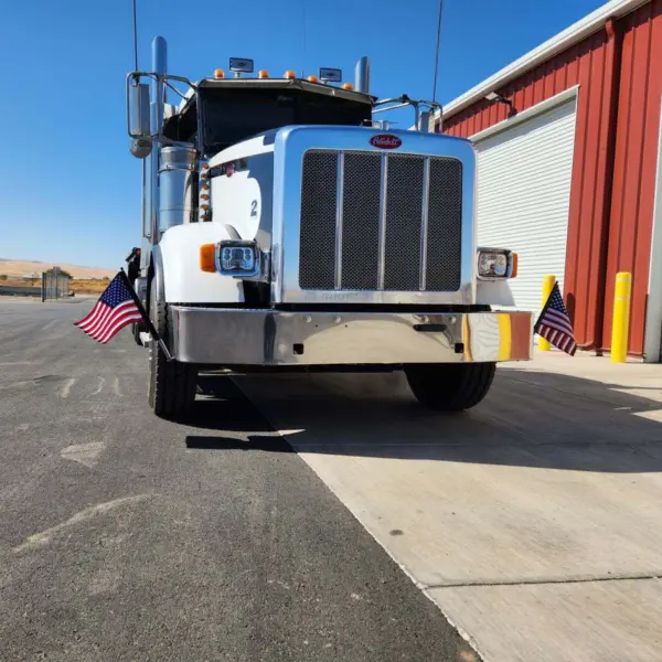 ez mount American flag mounted on a power unit’s front bumper